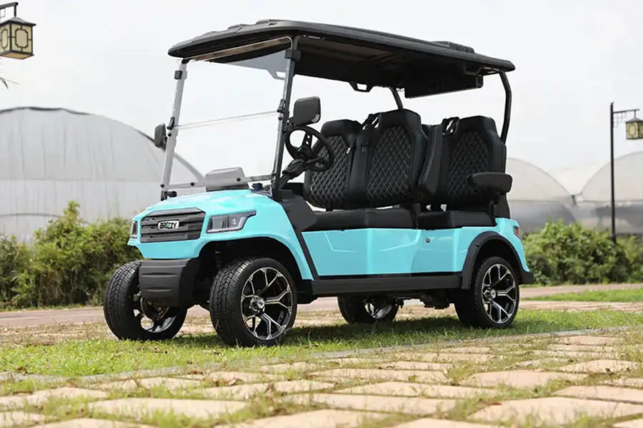 Breezy electric golf cart in blue with modern design, alloy wheels, and four-passenger seating parked on a residential pathway in Indianapolis