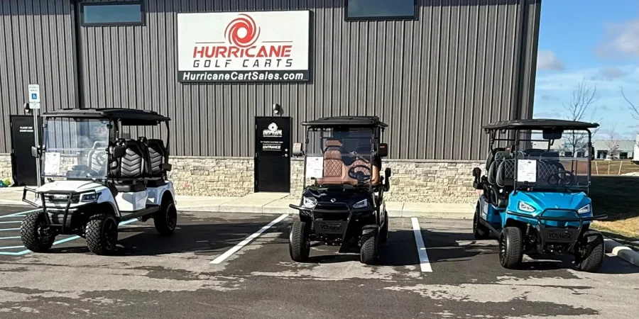 Hurricane Golf Carts lineup displayed outside the Hurricane Golf Carts dealership.”