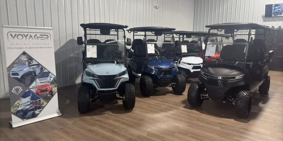 Voyager electric golf carts displayed in the Hurricane Golf Carts showroom.